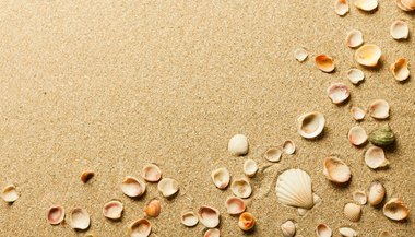 Sonhar com areia da praia