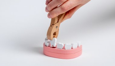 Sonhar que está arrancando o dente