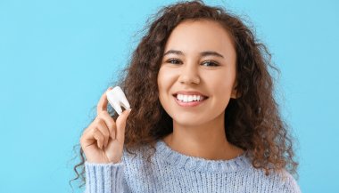 Sonhar que o dente caiu