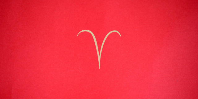 vermelho com símbolo de áries