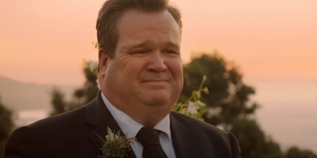 Foto do ator Eric Stonestreet como a personagem Cameron Tucker 