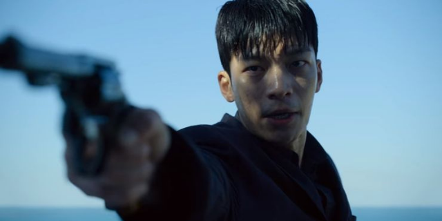 Imagem do personagem Hwang Jun-ho durante a série Round 6