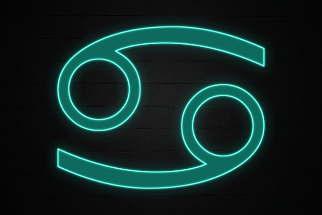 No foco da imagem, há o símbolo do signo de Câncer.