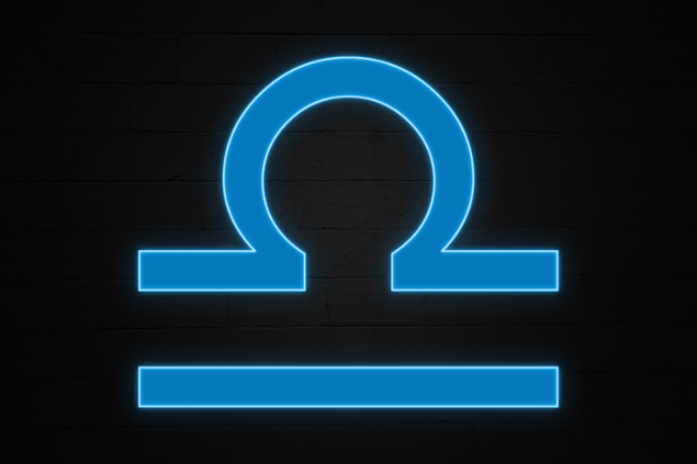 No foco da imagem, há o símbolo do signo de Libra.