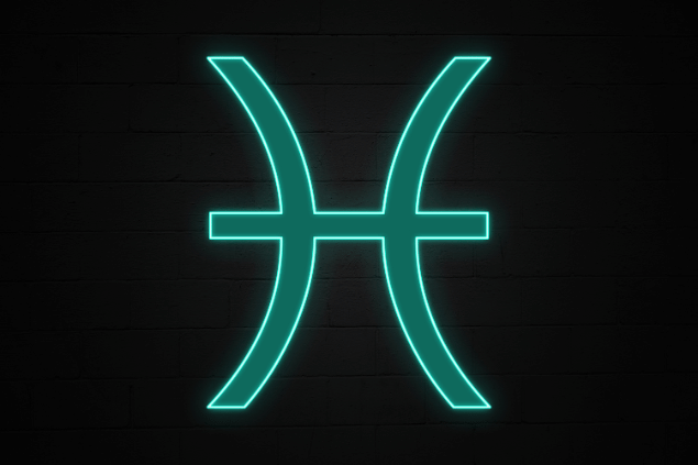 No foco da imagem, há o símbolo do signo de Peixes.