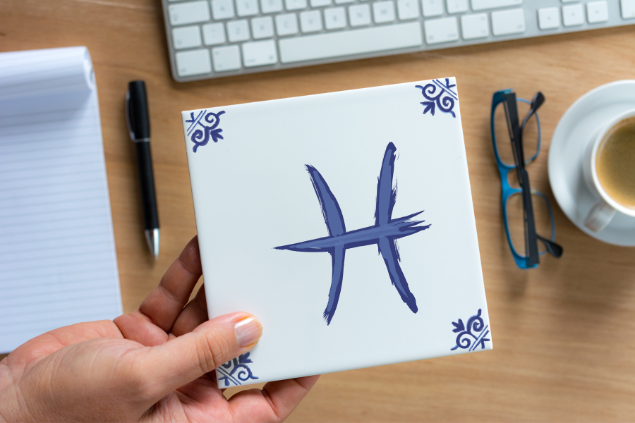 Desenho do símbolo de Peixes em azul