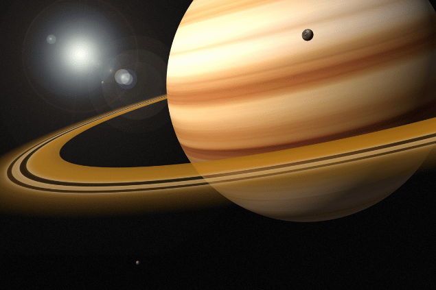 Imagem do planeta Saturno e, ao fundo, há o universo.