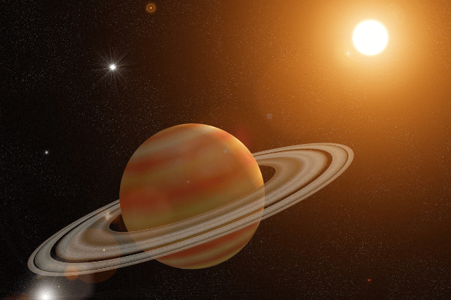 Imagem do planeta Saturno e, ao fundo, há o universo.