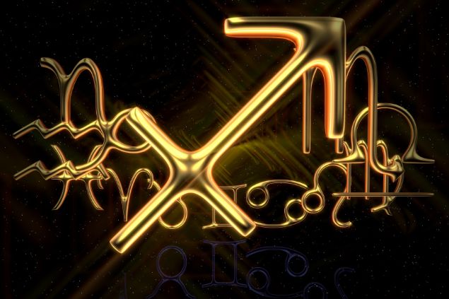 Imagem do elemento do signo de sagitário escrito em dourado em um fundo preto.