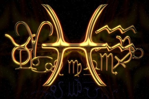 Imagem do elemento do signo de peixes escrito em dourado em um fundo preto.