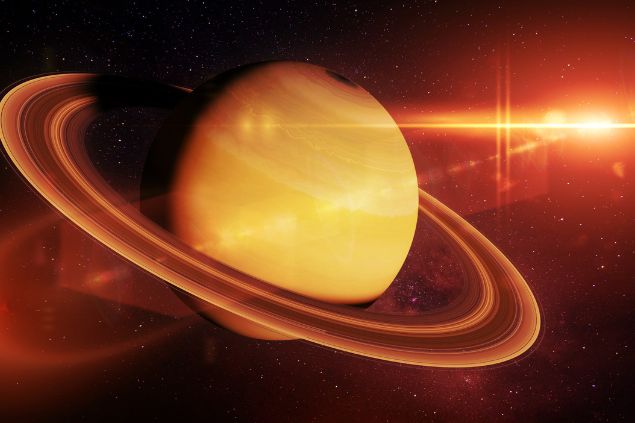 Imagem do planeta Saturno na cor alaranjada